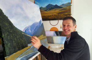 Andrew enjoying painting for relaxation