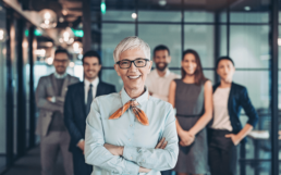 A leader standing in front of her team